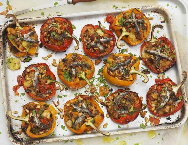 Stuffed peppers on a baking tray — Stock Photo