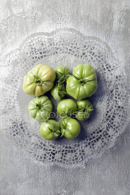 Lote de tomates verdes - foto de stock