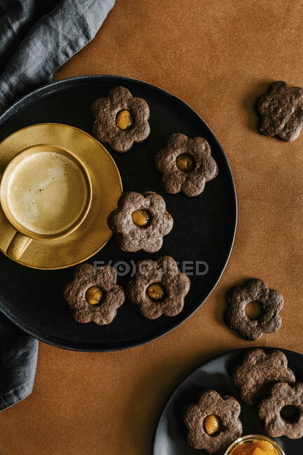 Dark chocolate cookies with sea buckthorn jam — Stock Photo
