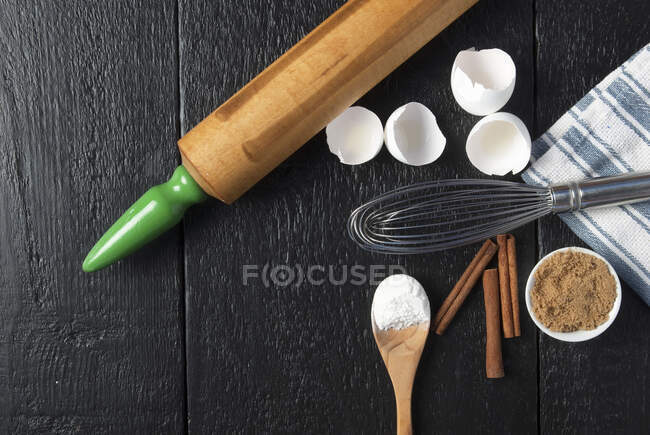 Ingredients for baking on a wooden background — Stock Photo
