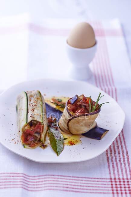 Ratatouille rolls and a soft boiled egg — Stock Photo