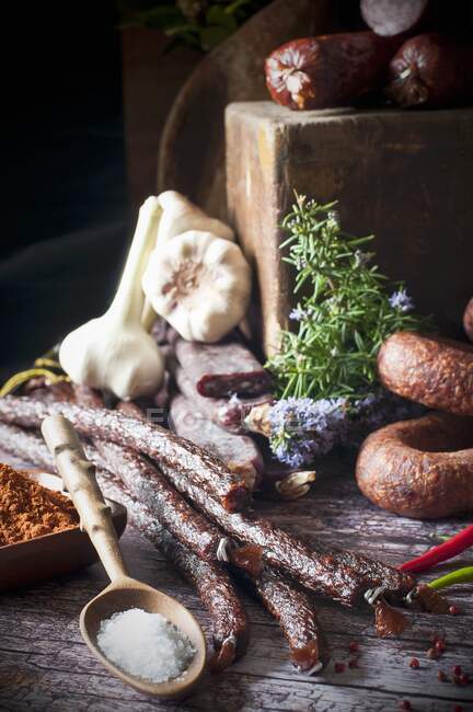 An arrangement of smoked and dried red venison sausages — Stock Photo
