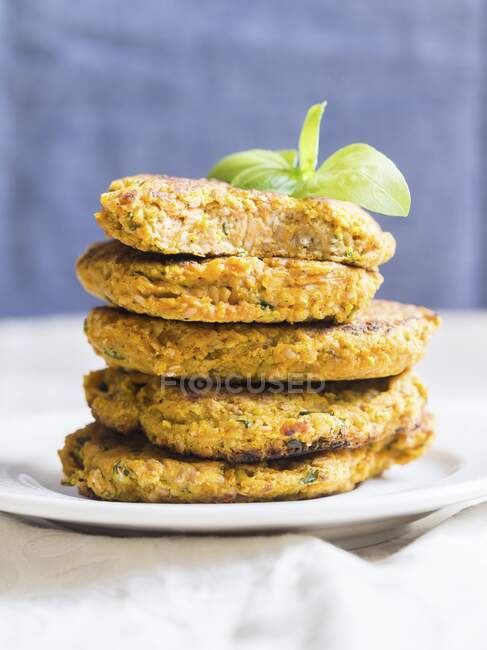 Healthy vegan vegetable burgers arranged in a pile — Stock Photo