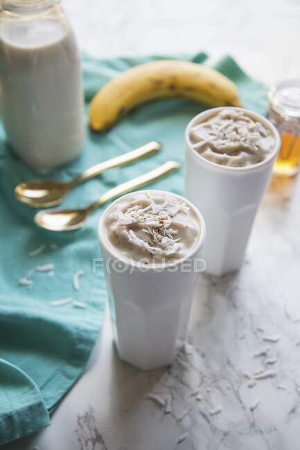 Almond milk shake with banana and coconut — Stock Photo
