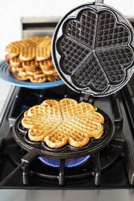 Process of baking waffles, close up — Stock Photo