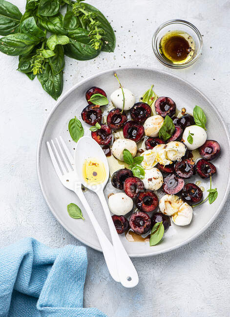 Caprese with cherries close-up view — Stock Photo