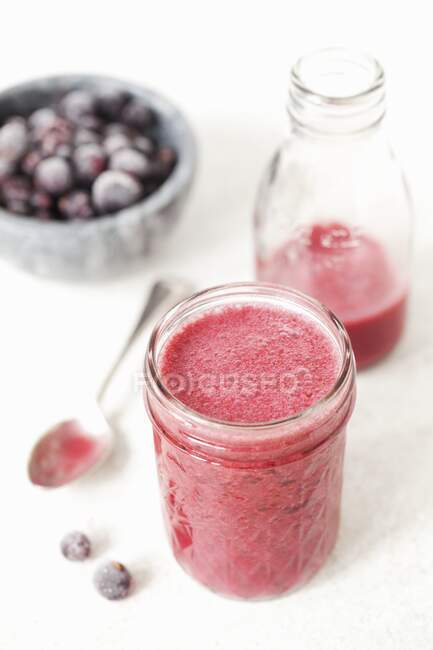 Blackcurrant Coconut Smoothie in glasses — Stock Photo