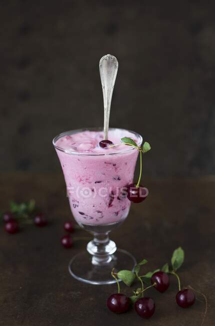 Cherry cream in stalk glass — Stock Photo