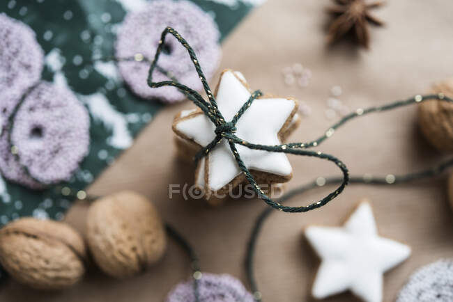 A stack of cinnamon stars tied with string — Stock Photo