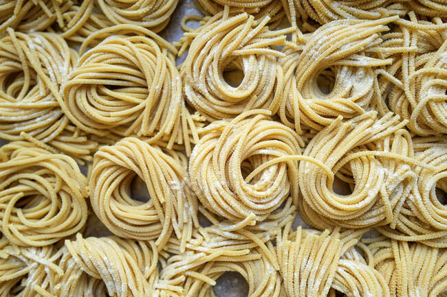 Fresh pasta nests pattern — Stock Photo