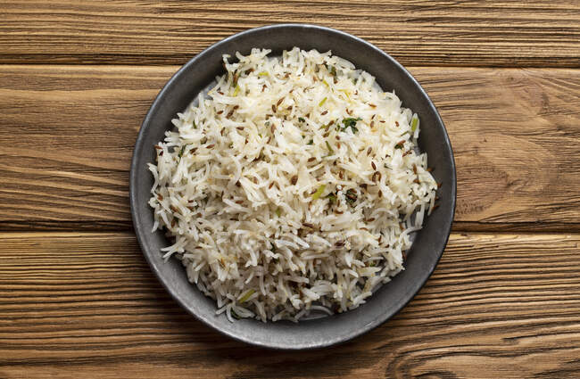 Indian boiled biryani rice with salad with cumin — Stock Photo