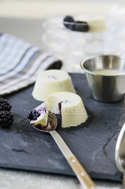 Close-up shot of delicious Cream pudding with blackberries — Stock Photo