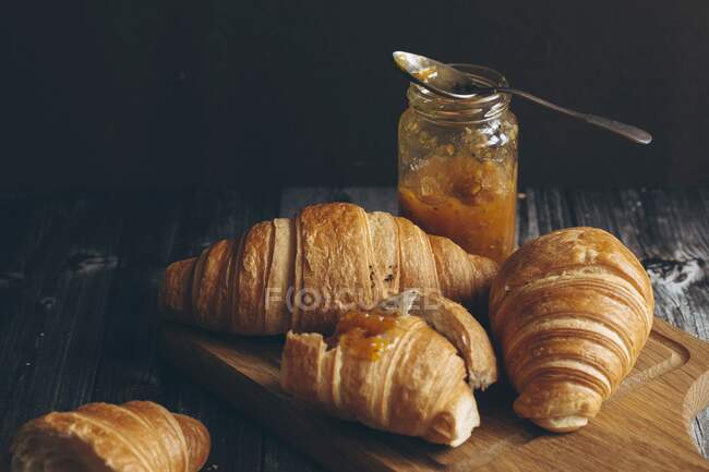Croissants and jam close-up view — Stock Photo