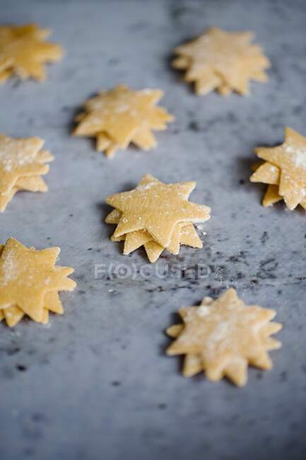 Small stacks of pasta stars — Stock Photo