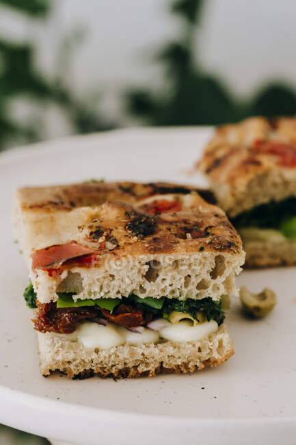 Focaccia sandwich with dried tomatoes — Stock Photo
