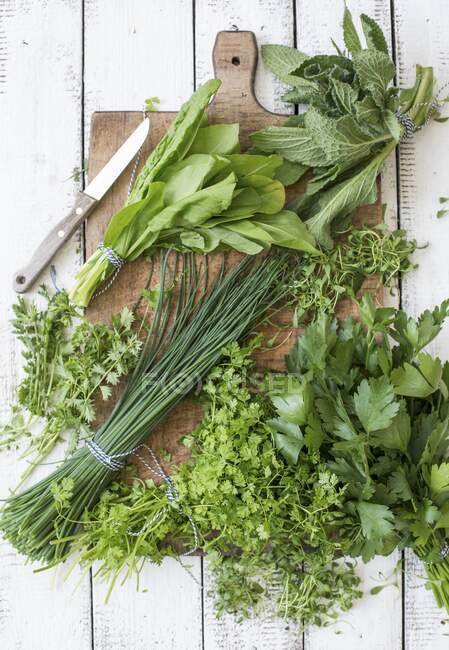 Fresh herbs for making green sauce — Stock Photo