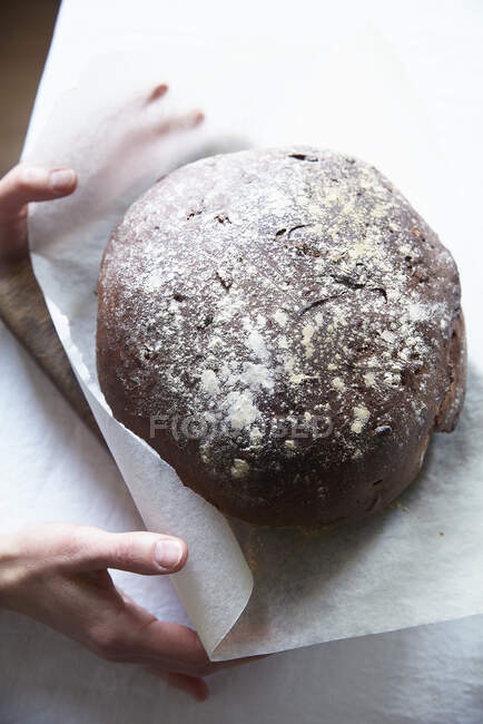 Freshly baked loaf and chocolate cake — Stock Photo