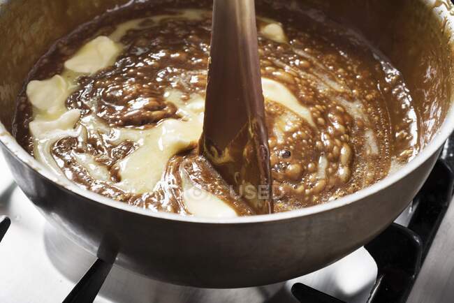 Caramel being heated in a pan — Stock Photo