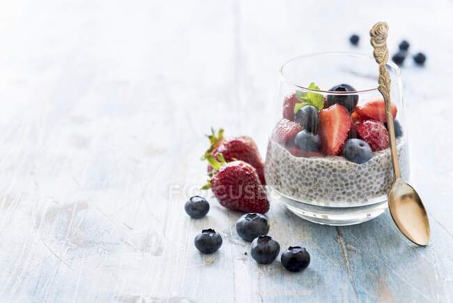 Chia pudding with berries in a glass — Stock Photo