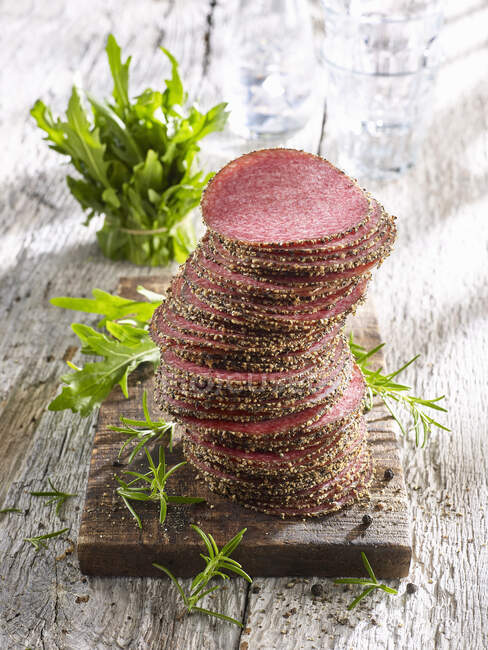 A stack of pepper salami slices — Stock Photo