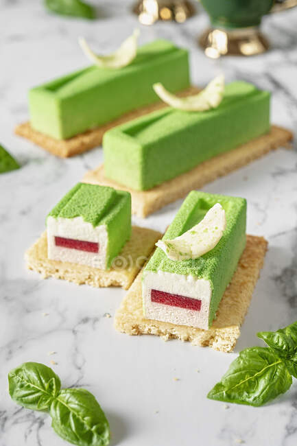 Mousse cakes with basil and strawberry — Stock Photo