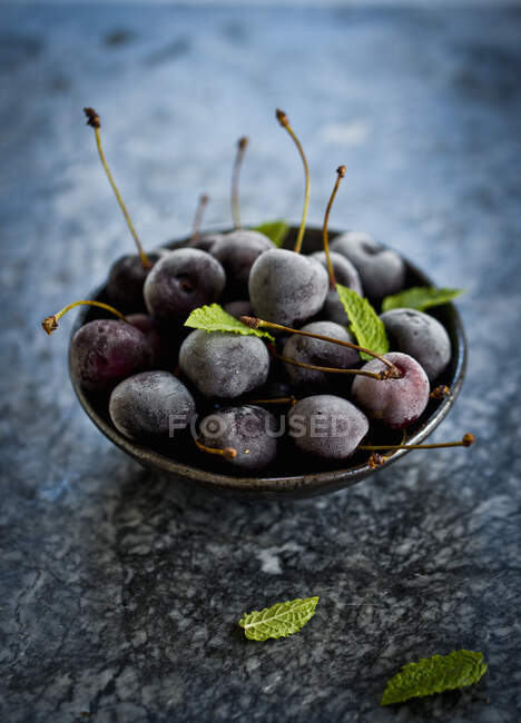 Frozen cherries in a bowl — Stock Photo