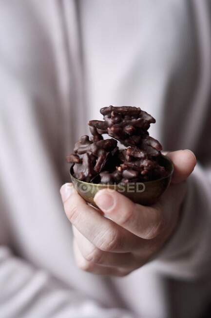 Caramelised almonds covered in chocolate — Stock Photo