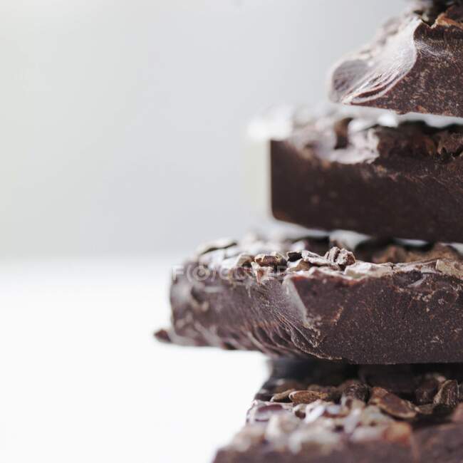 Close shot of blocks of chocolate in a stack — Stock Photo