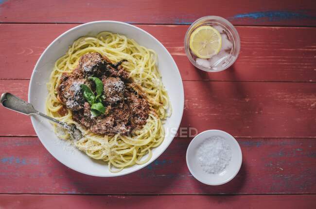 Spaghetti with meatballs and parmesan — Stock Photo