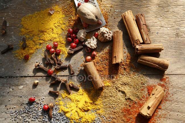 Various oriental spices on a wooden table — Stock Photo
