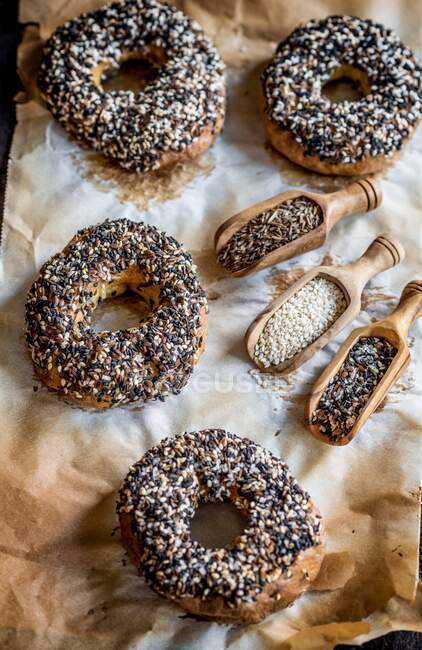 Freshly baked bagels with healthy seeds on the top — Stock Photo