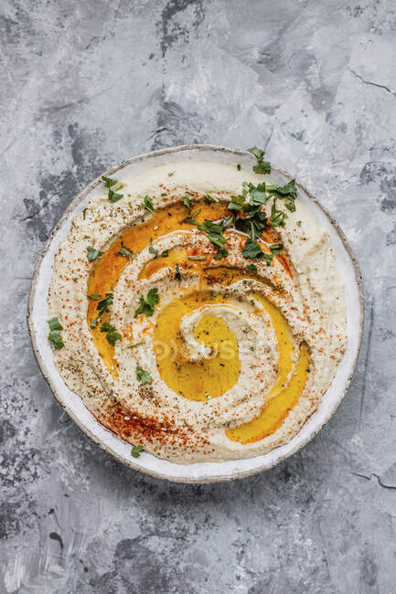 Hummus in a bowl — Stock Photo