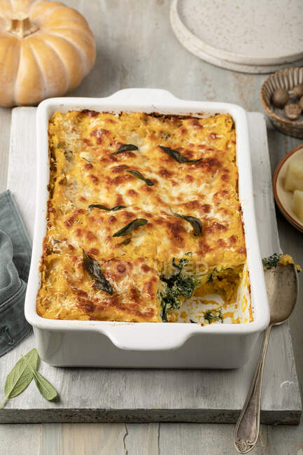 Pumpkin lasagne with ricotta, spinach and mozzarella — Stock Photo