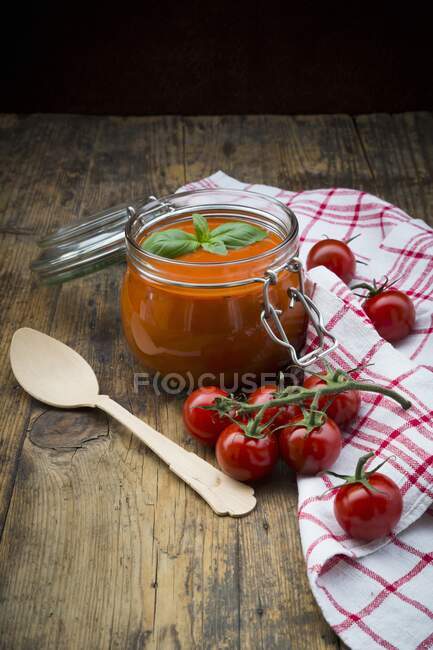 Tomato soup in a glass jar — Stock Photo