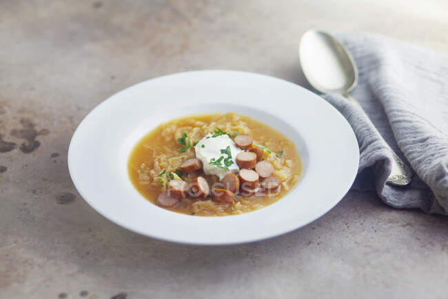 Sauerkraut soup with cabanossi — Stock Photo
