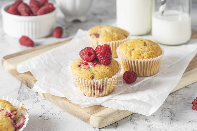 Almond muffins with raspberries — Stock Photo