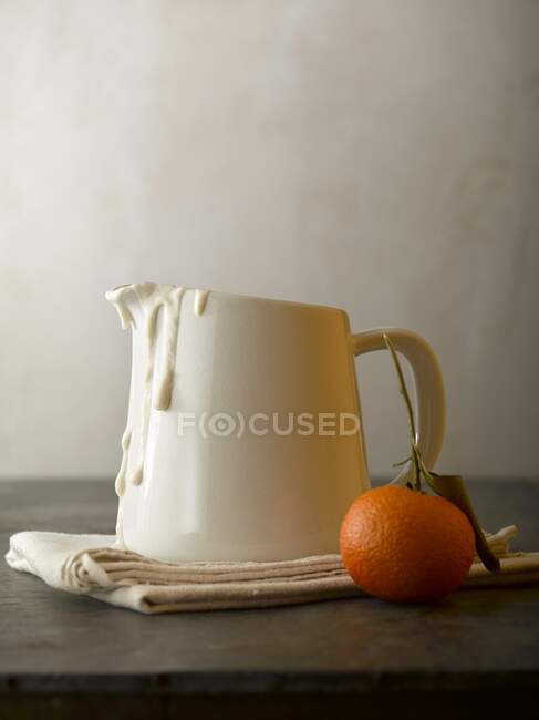 Waffle batter in a jug — Stock Photo