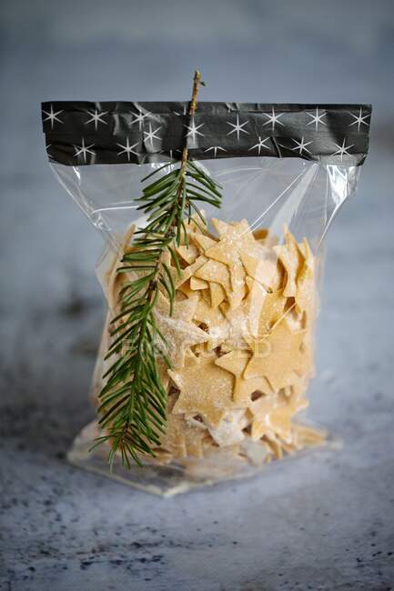 Pasta stars, packed in a bag — Stock Photo
