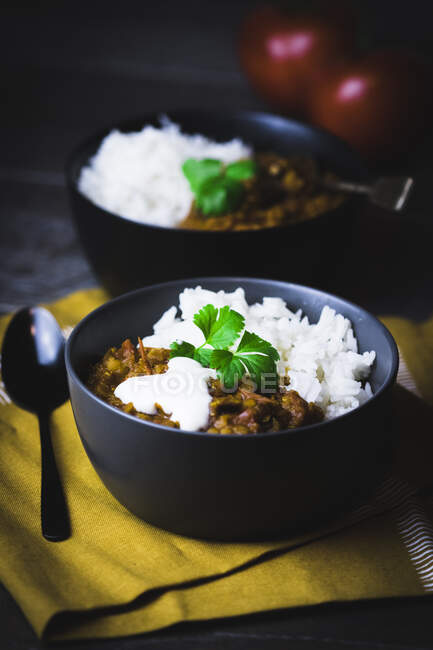 Red lentil dal with tomato, cumin and rice — Stock Photo