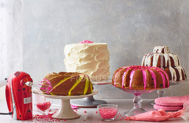 Cake buffet on grey background — Stock Photo
