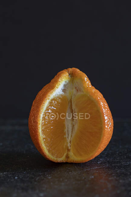 Sliced orange part, close up shot — Stock Photo