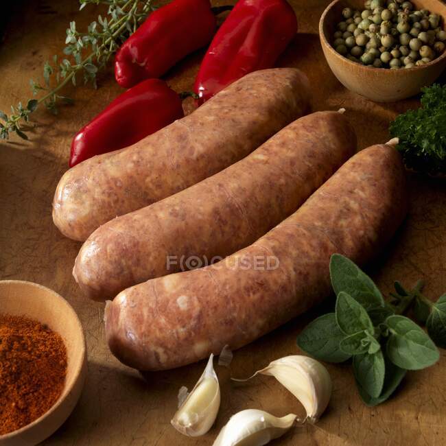 Spicy pork sausage with peppers, garlic, herbs and spices — Stock Photo