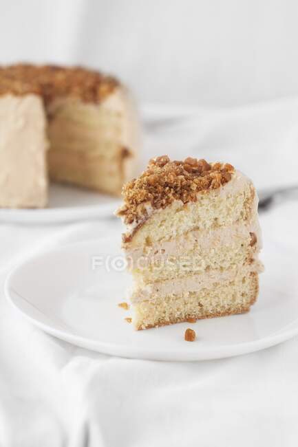 Caramel cream cake with brittle — Stock Photo