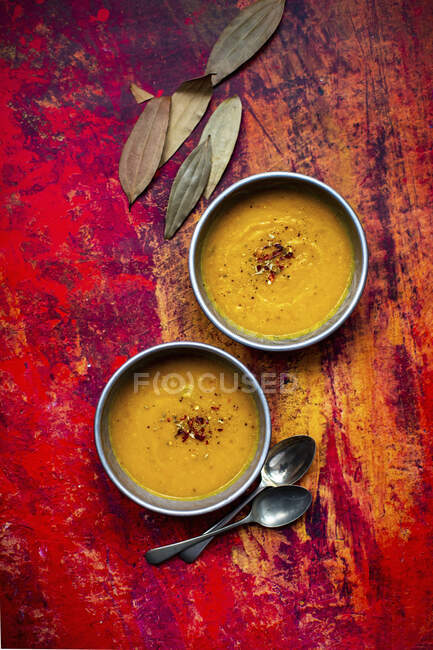 Pumpkin cream soup in bowls — Stock Photo