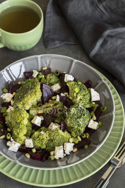 Beetroot, broccoli, cheese and pine nuts salad — Stock Photo