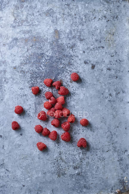 Fresh ripe berries on a gray background. top view. copy space. — Stock Photo