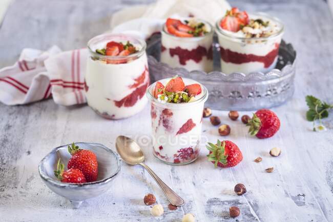 Strawberries, yoghurt, and nut desserts with chia seeds — Stock Photo