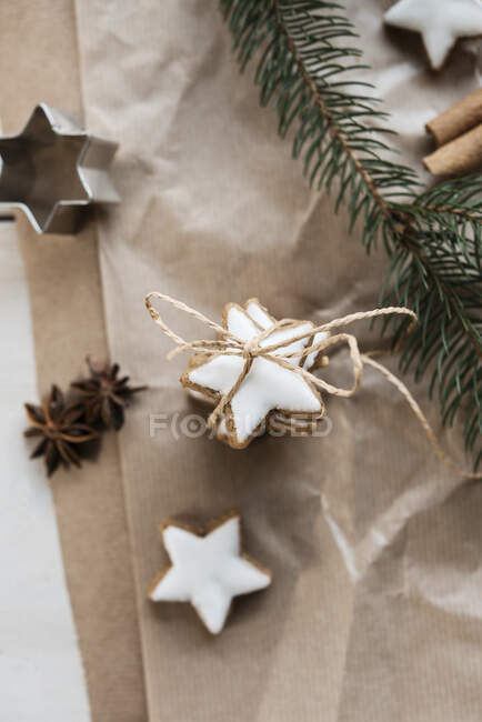 A stack of cinnamon stars tied with string — Stock Photo