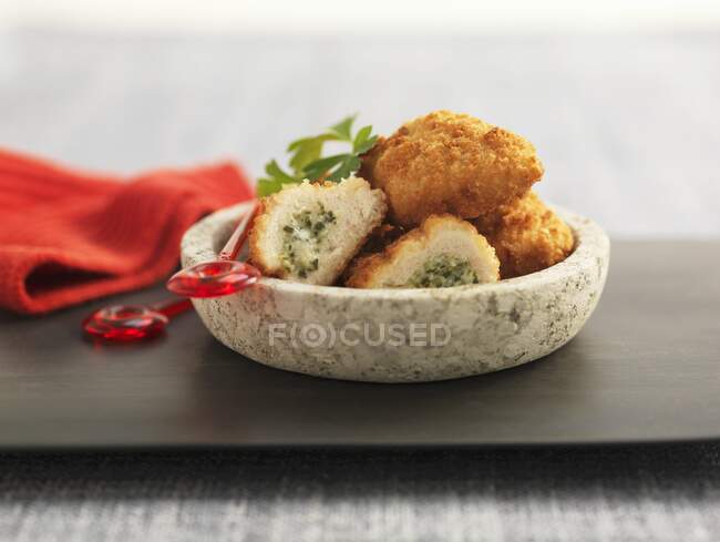 Chicken kiev appetisers in a bowl — Stock Photo