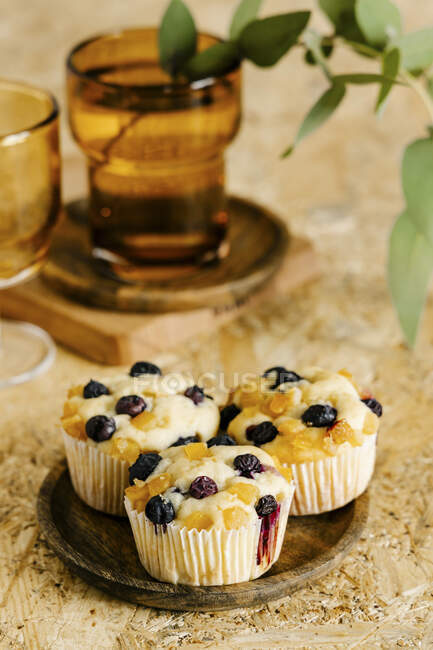 Ricotta muffins with blueberry and orange candied fruit — Stock Photo